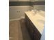 This is a bathroom featuring a double vanity and neutral decor at 5016 Gailardia Dr, Zebulon, NC 27597