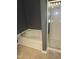 This bathroom features a shower and a soaking tub at 5016 Gailardia Dr, Zebulon, NC 27597