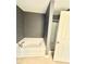 Bathroom with a tub and separate shower stall at 5016 Gailardia Dr, Zebulon, NC 27597
