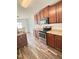 Well-equipped kitchen features stainless steel appliances, wood cabinets and ample countertop space at 5016 Gailardia Dr, Zebulon, NC 27597