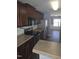 Kitchen with stainless steel appliances, dark cabinets, and plenty of counter space at 5016 Gailardia Dr, Zebulon, NC 27597