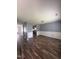 Living room with chair rail and wood-look floors at 5016 Gailardia Dr, Zebulon, NC 27597