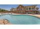 Beautiful outdoor pool with clear blue water and surrounding brick building, perfect for summer relaxation and enjoyment at 5045 Kota St, Raleigh, NC 27610