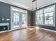 Open dining room with stylish light fixture and lots of natural light at 5347 Cypress Ln, Raleigh, NC 27609