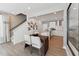 Bright dining area near kitchen, featuring modern decor and easy access to the staircase at 600 Hedrick Ridge Road # 112, Cary, NC 27519
