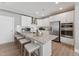 This kitchen features stainless steel appliances, granite countertops, an island and great lighting at 600 Hedrick Ridge Road # 112, Cary, NC 27519