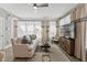 Inviting living room filled with natural light, showcasing elegant furnishings and a relaxing atmosphere at 600 Hedrick Ridge Road # 112, Cary, NC 27519