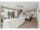 Open-concept living area with modern furniture, stairs, dining and a view to the kitchen at 600 Hedrick Ridge Road # 112, Cary, NC 27519