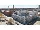 Aerial view of a city landscape featuring industrial and urban architectural elements under a clear sky at 602 Gray Ave, Durham, NC 27701