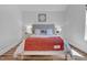 Cozy bedroom featuring an inviting bed with a soft, textured duvet and warm throw blanket at 602 Gray Ave, Durham, NC 27701