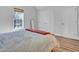 Bright bedroom with a large window providing ample natural light and view, plus two closets at 602 Gray Ave, Durham, NC 27701