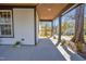 View of covered front porch with stained wood ceiling and view of the neighborhood at 602 Gray Ave, Durham, NC 27701