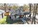 Charming house featuring a covered front porch and inviting entry way, plus landscaped yard at 602 Gray Ave, Durham, NC 27701