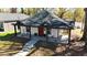 Charming house featuring a covered front porch and inviting entry way, plus landscaped yard at 602 Gray Ave, Durham, NC 27701