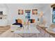 Bright living room featuring a stylish couch, modern decor, and a neutral color palette for a serene ambiance at 602 Gray Ave, Durham, NC 27701