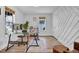 Bright office space featuring a glass desk, wood-look flooring, and ample natural light at 602 Gray Ave, Durham, NC 27701