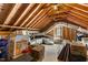 Spacious attic featuring exposed rafters and wooden beams, with lots of storage perfect for organizational enthusiasts at 6750 Olde Province Ct, Raleigh, NC 27609