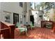 Outdoor deck with seating area overlooks yard, perfect for enjoying the surrounding greenery in private at 6750 Olde Province Ct, Raleigh, NC 27609