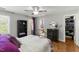 Bedroom with natural light, hardwood floors, and a closet at 6750 Olde Province Ct, Raleigh, NC 27609