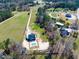 Aerial view of home, pool, and grounds at 73 Clyde Pearce Rd, Zebulon, NC 27597