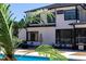 The backyard features an in-ground pool and lounge seating at 73 Clyde Pearce Rd, Zebulon, NC 27597