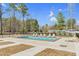 Community pool with lounge chairs, fully fenced for privacy at 73 Clyde Pearce Rd, Zebulon, NC 27597