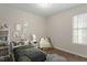 Charming bedroom with natural light and cozy decor at 815 Riverbark Ln, Durham, NC 27703