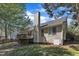 Backyard featuring a wooden deck, neutral colored siding, and a well-kept lawn in a great neighborhood at 9512 Anson Grove Ln, Raleigh, NC 27615