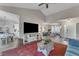 Spacious open-concept living area with wood-look flooring, offering seamless flow and modern design at 9512 Anson Grove Ln, Raleigh, NC 27615