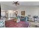 Inviting living room with wood flooring, comfortable sofa, and elegant decor at 9512 Anson Grove Ln, Raleigh, NC 27615