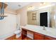 Bathroom with wood floors, vanity with marble countertop, and shower with tub at 1 Serenity Ct, Durham, NC 27704