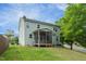 Exterior elevation showing backyard and screened porch at 1 Serenity Ct, Durham, NC 27704