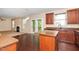 Open-concept kitchen featuring a center island and seamlessly connects to the living room at 1 Serenity Ct, Durham, NC 27704