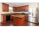 Well-lit kitchen featuring stainless steel appliances, ample cabinetry, and a center island at 1 Serenity Ct, Durham, NC 27704