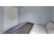 This bedroom has a closet with white doors and brushed nickel hardware at 100 Hillside Village Dr, Louisburg, NC 27549