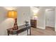 Lovely entryway showcases stylish decor and sleek wood-look flooring at 100 Hillside Village Dr, Louisburg, NC 27549