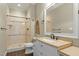 Bathroom featuring a walk-in shower and a vanity with a white cabinet at 1009 High Trail Ct, Wake Forest, NC 27587