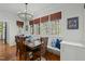 Charming breakfast nook with a window seat and a rustic dining table at 1009 High Trail Ct, Wake Forest, NC 27587