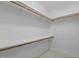 Bright walk-in closet with built in shelving at 1009 High Trail Ct, Wake Forest, NC 27587
