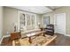 Cozy sitting area in the finished basement with comfortable furniture at 1009 High Trail Ct, Wake Forest, NC 27587