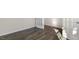 Bright room featuring a French door and luxury vinyl plank flooring at 1100 Ursa Major Ct, Wendell, NC 27591