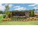 An attractive stone-clad entrance sign welcomes residents and visitors to Anderson Farm community at 1100 Ursa Major Ct, Wendell, NC 27591