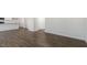 Spacious living room showcasing luxury vinyl plank flooring and neutral paint at 1100 Ursa Major Ct, Wendell, NC 27591