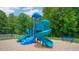 Vibrant community playground with modern equipment, featuring slides and climbing structures for children to play and explore at 1100 Ursa Major Ct, Wendell, NC 27591
