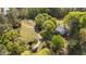 Expansive property featuring a stately home, mature trees, and a charming garden at 1188 Turner Rd, Creedmoor, NC 27522