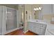 The bathroom has a tub and shower combination, and neutral colors at 1188 Turner Rd, Creedmoor, NC 27522