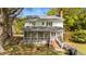 Charming two-story home with a screened porch, inviting brick steps, and a well-maintained yard at 1188 Turner Rd, Creedmoor, NC 27522