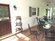 Exterior view of the home, with a screened in porch and brick patio for outdoor relaxation and enjoyment at 1188 Turner Rd, Creedmoor, NC 27522