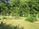 A great spot to grow your own vegetables with raised garden beds and a protective fence at 1188 Turner Rd, Creedmoor, NC 27522