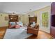 Warm and inviting living room featuring a cozy leather seating, fireplace and hardwood floors at 1188 Turner Rd, Creedmoor, NC 27522